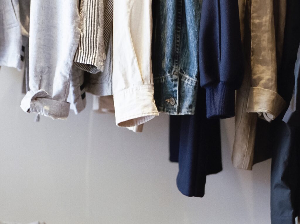 clothes hanging in closet