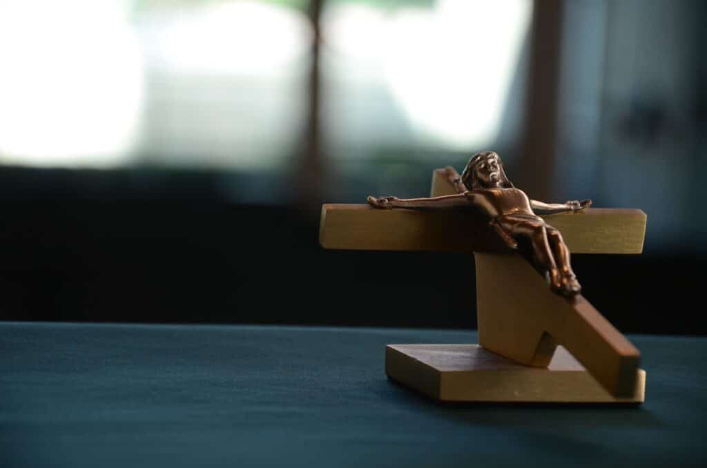 close up of crucifix on table