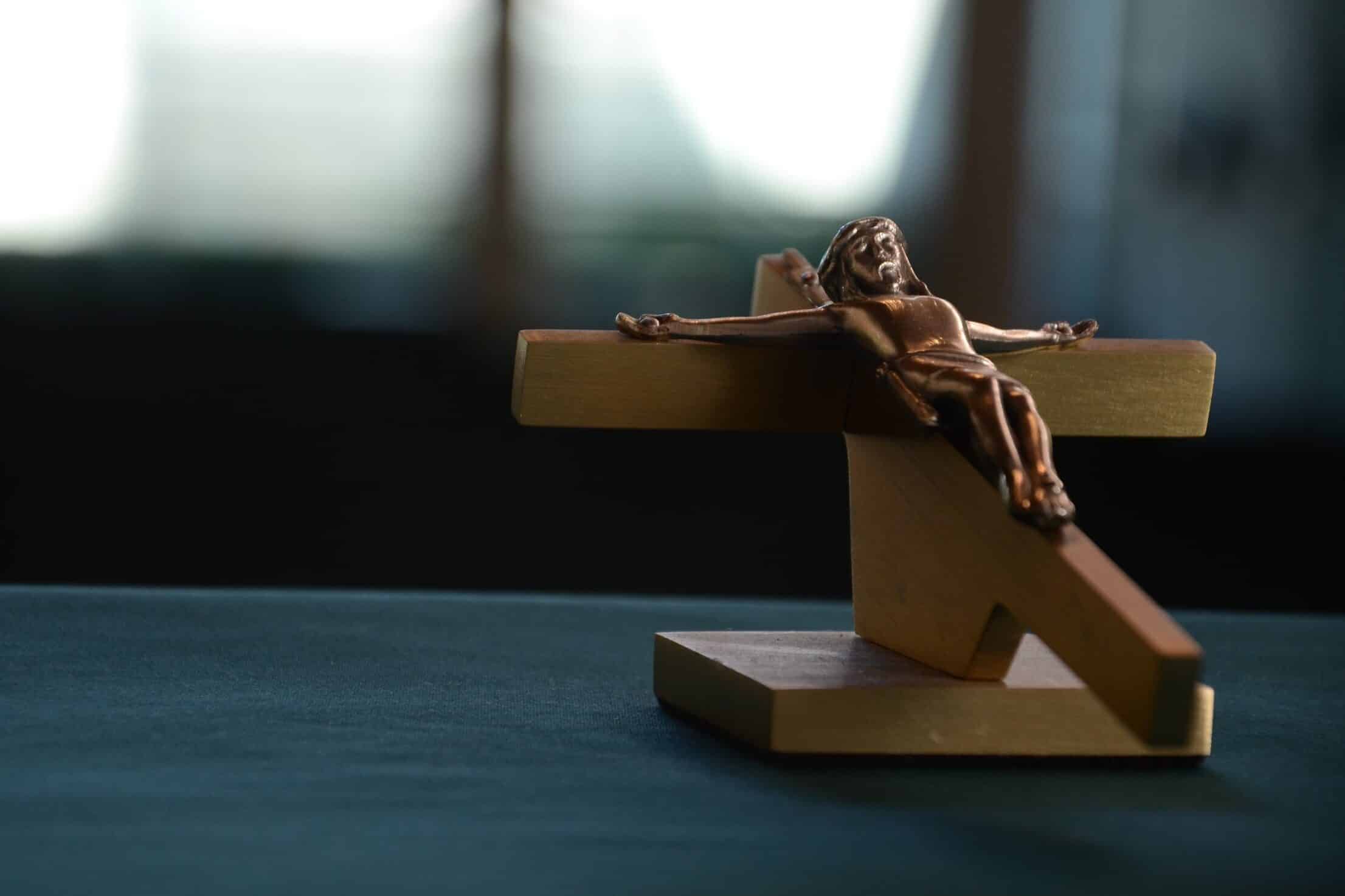 close up of crucifix on table